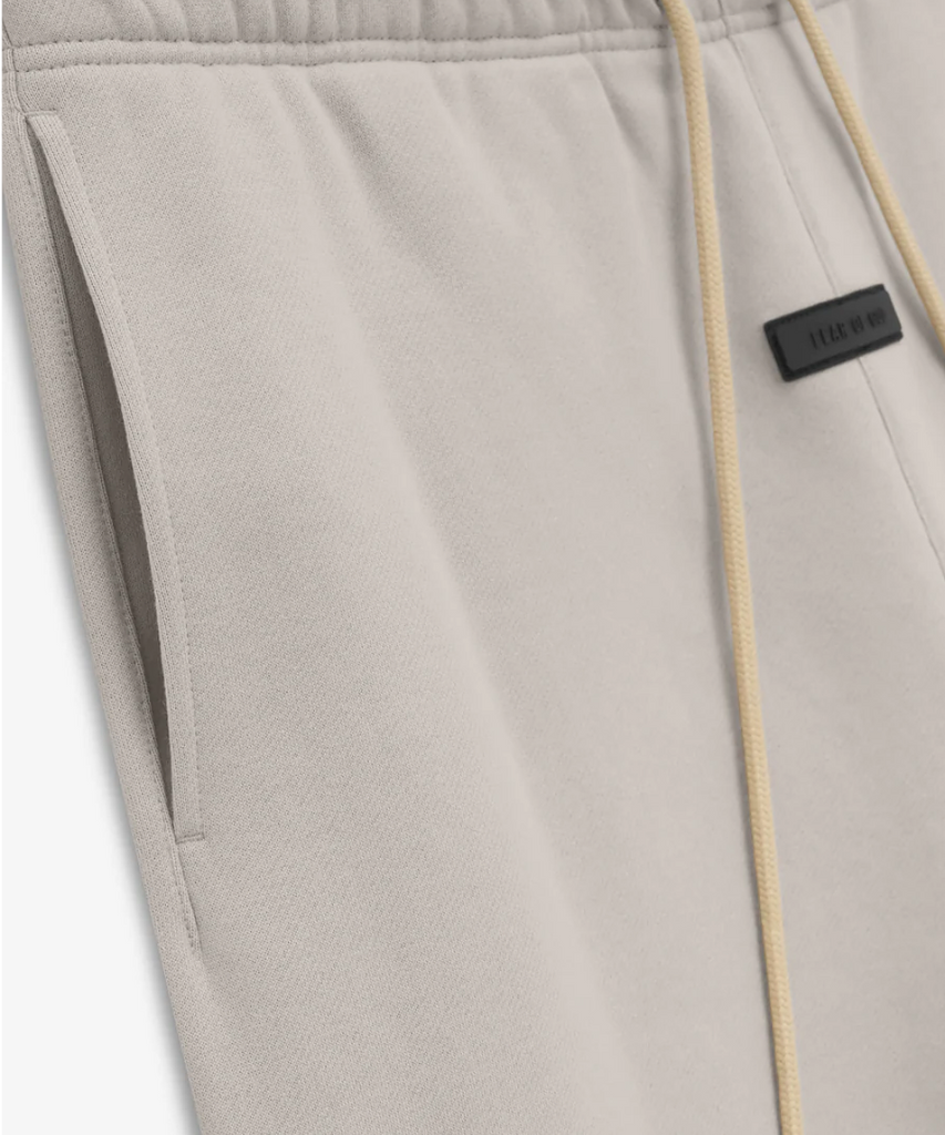 Official Fear Of God ESSENTIALS Sweatpants FW23 in Silver Cloud at ShoeGrab