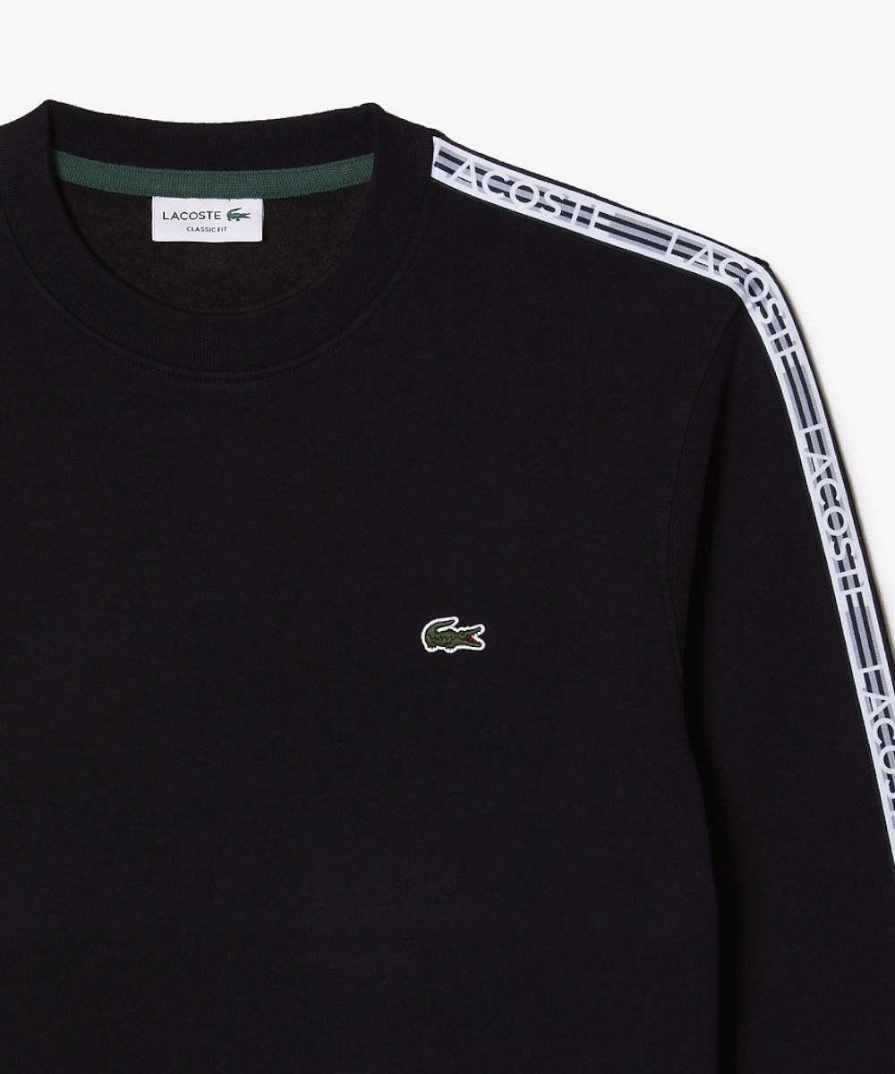 Official Lacoste Logo Tape Fleece Crew Neck Sweater in Black at